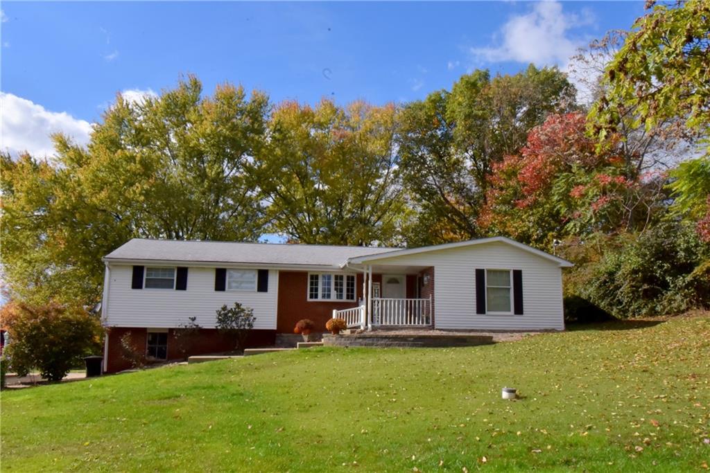 503 McKee Road Washington, PA 15301 - Photo 1 of 24 a view of a house with a backyard