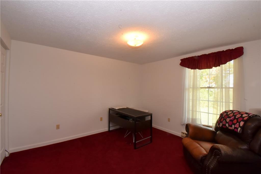 503 McKee Road Washington, PA 15301 - Photo 12 of 24 a living room with furniture and a window