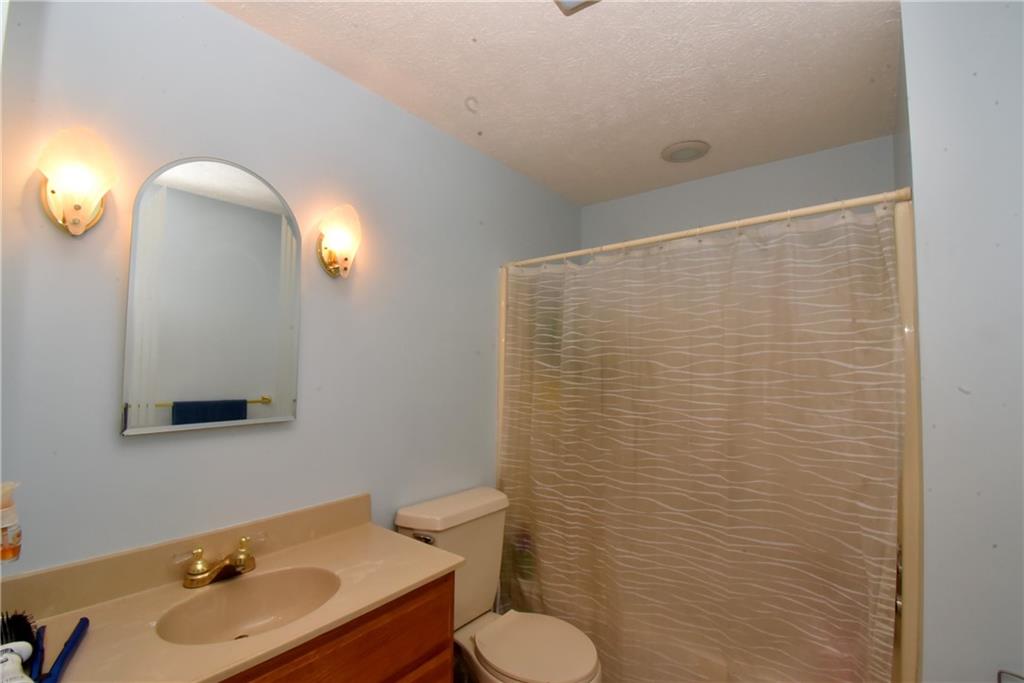 503 McKee Road Washington, PA 15301 - Photo 13 of 24 a bathroom with a sink toilet and mirror