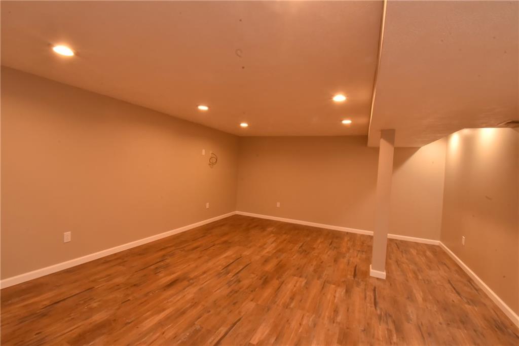 503 McKee Road Washington, PA 15301 - Photo 18 of 24 a view of an empty room with wooden floor