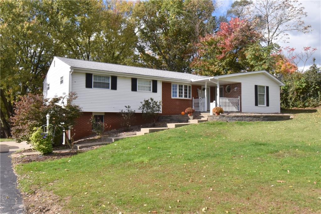 503 McKee Road Washington, PA 15301 - Photo 23 of 24 a front view of house with yard fire pit and outdoor seating