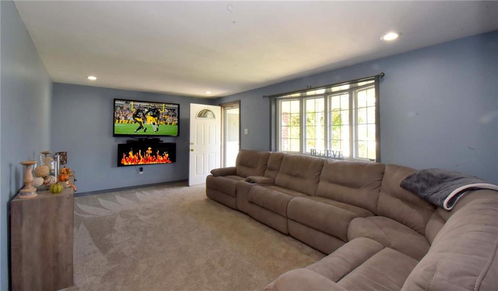 503 McKee Road Washington, PA 15301 - Photo 5 of 24 a living room with furniture and a flat screen tv