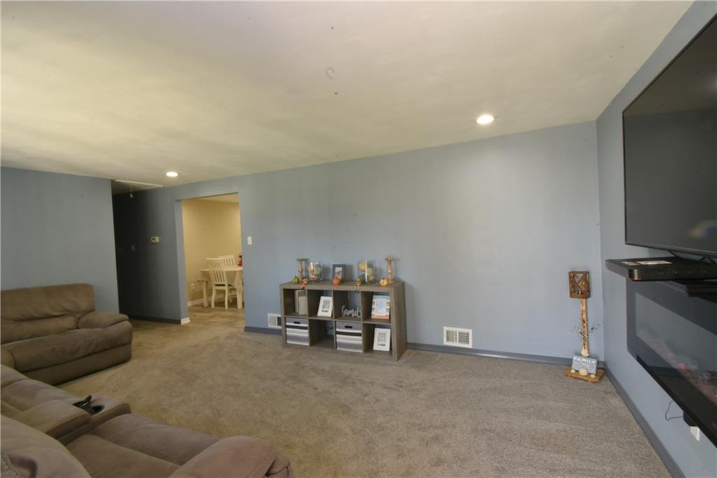503 McKee Road Washington, PA 15301 - Photo 6 of 24 a living room with furniture and a flat screen tv