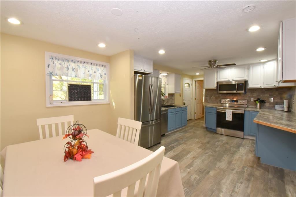 503 McKee Road Washington, PA 15301 - Photo 9 of 24 a large kitchen with a large counter top appliances and cabinets