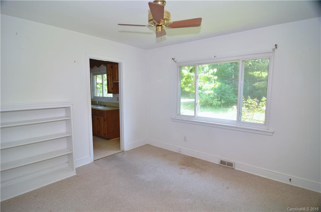 6207 Tuckaseegee Road Charlotte, NC 28208 - Photo 11 of 20 a view of an empty room with a window