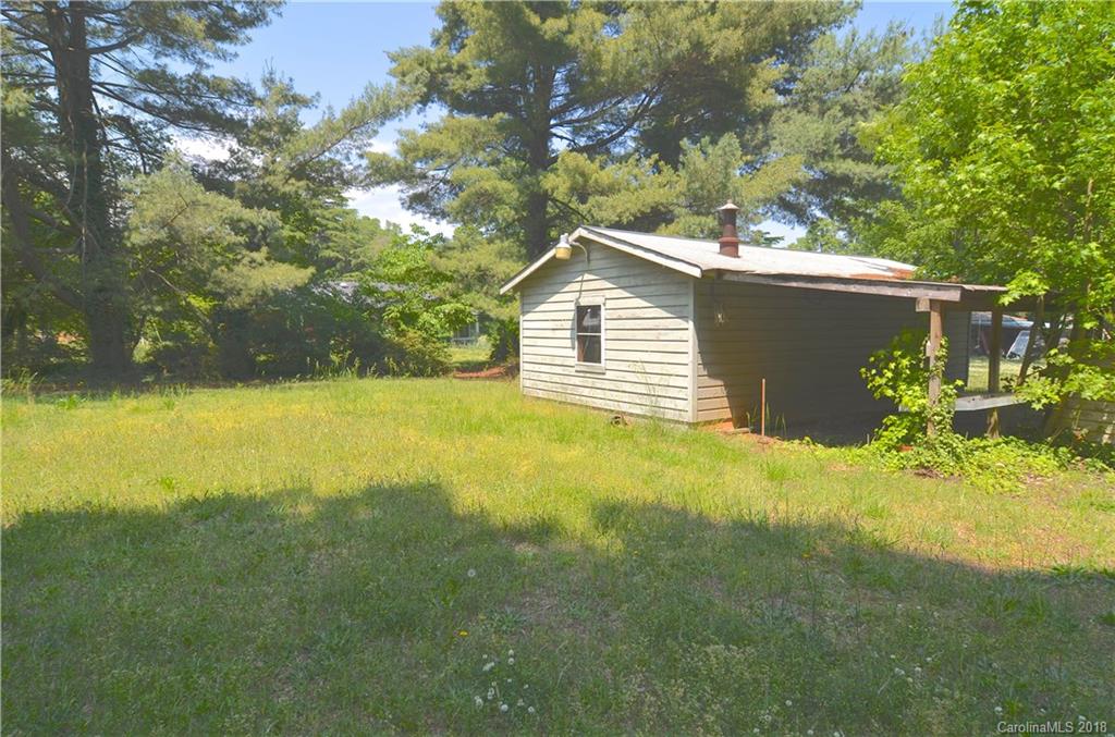 6207 Tuckaseegee Road Charlotte, NC 28208 - Photo 14 of 20 a view of a house with a yard