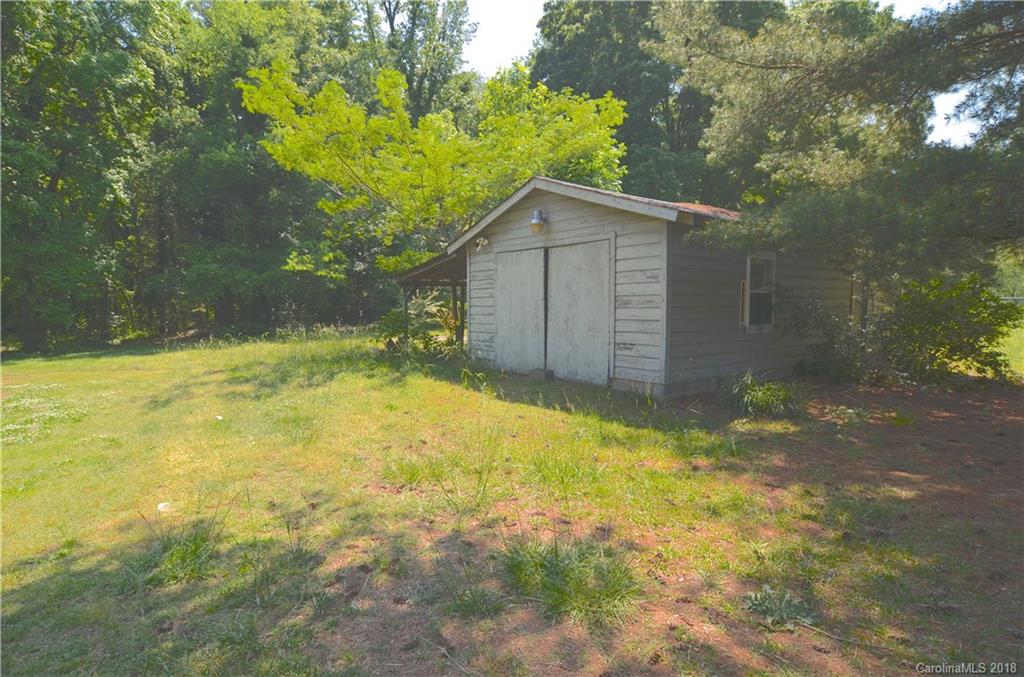 6207 Tuckaseegee Road Charlotte, NC 28208 - Photo 16 of 20 a view of backyard with outdoor space