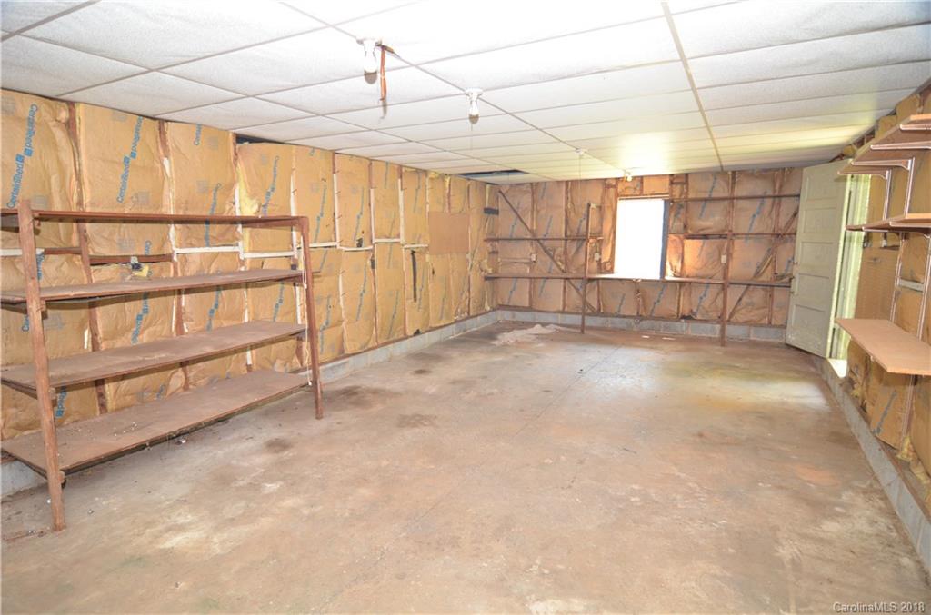 6207 Tuckaseegee Road Charlotte, NC 28208 - Photo 17 of 20 a view of an empty room with a window