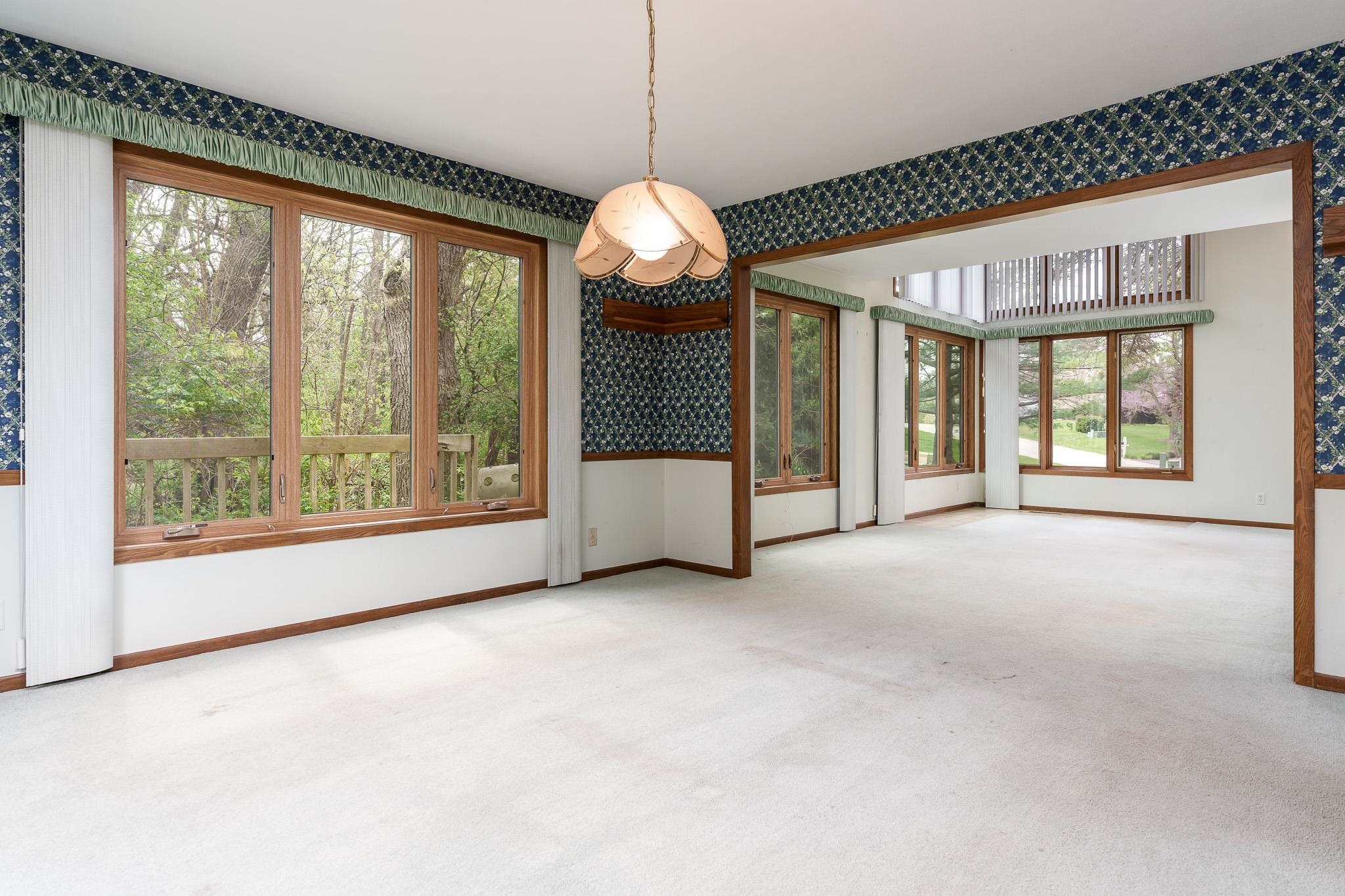 10245 Tybow Trail Roscoe, IL 61073 - Photo 11 of 63 a view of a livingroom with an empty space and a window