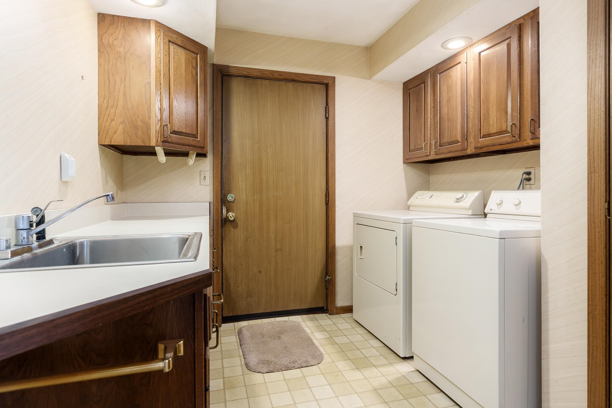 10245 Tybow Trail Roscoe, IL 61073 - Photo 26 of 63 a bathroom with a sink and a mirror