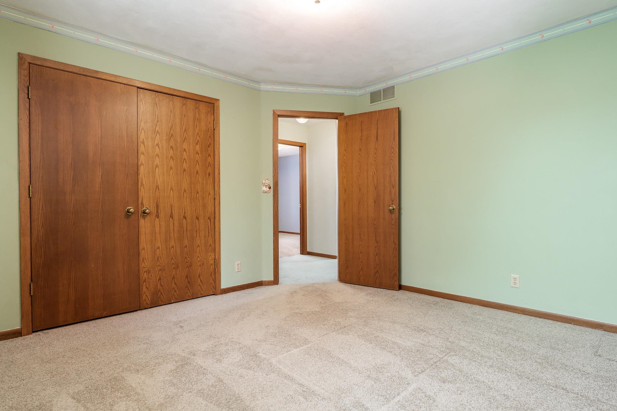 10245 Tybow Trail Roscoe, IL 61073 - Photo 37 of 63 a view of an empty room with a window