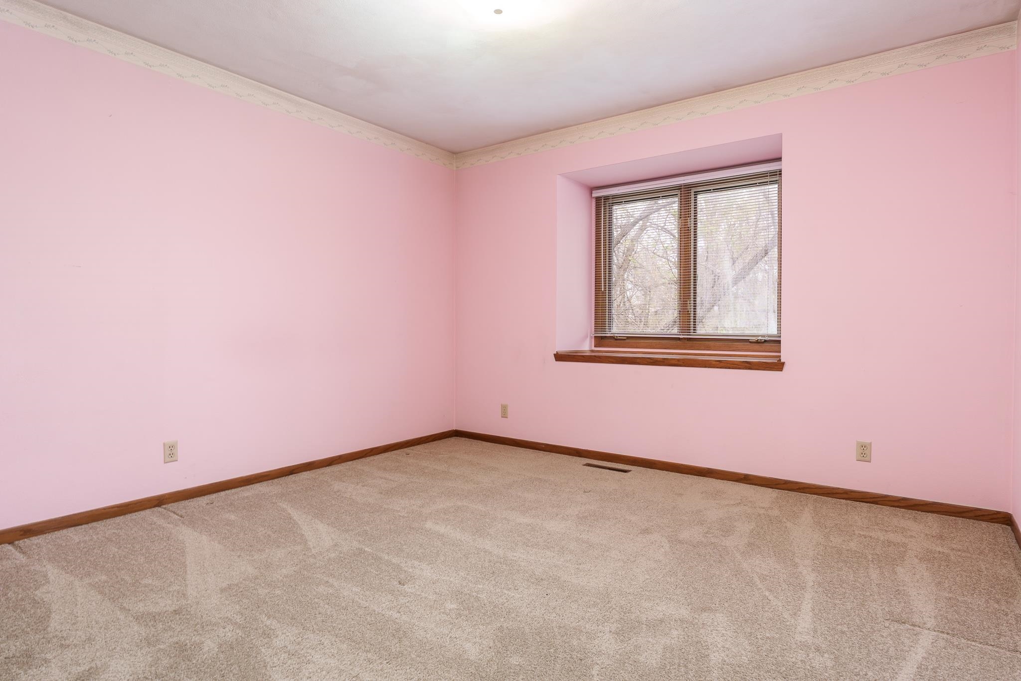 10245 Tybow Trail Roscoe, IL 61073 - Photo 38 of 63 an empty room with a window