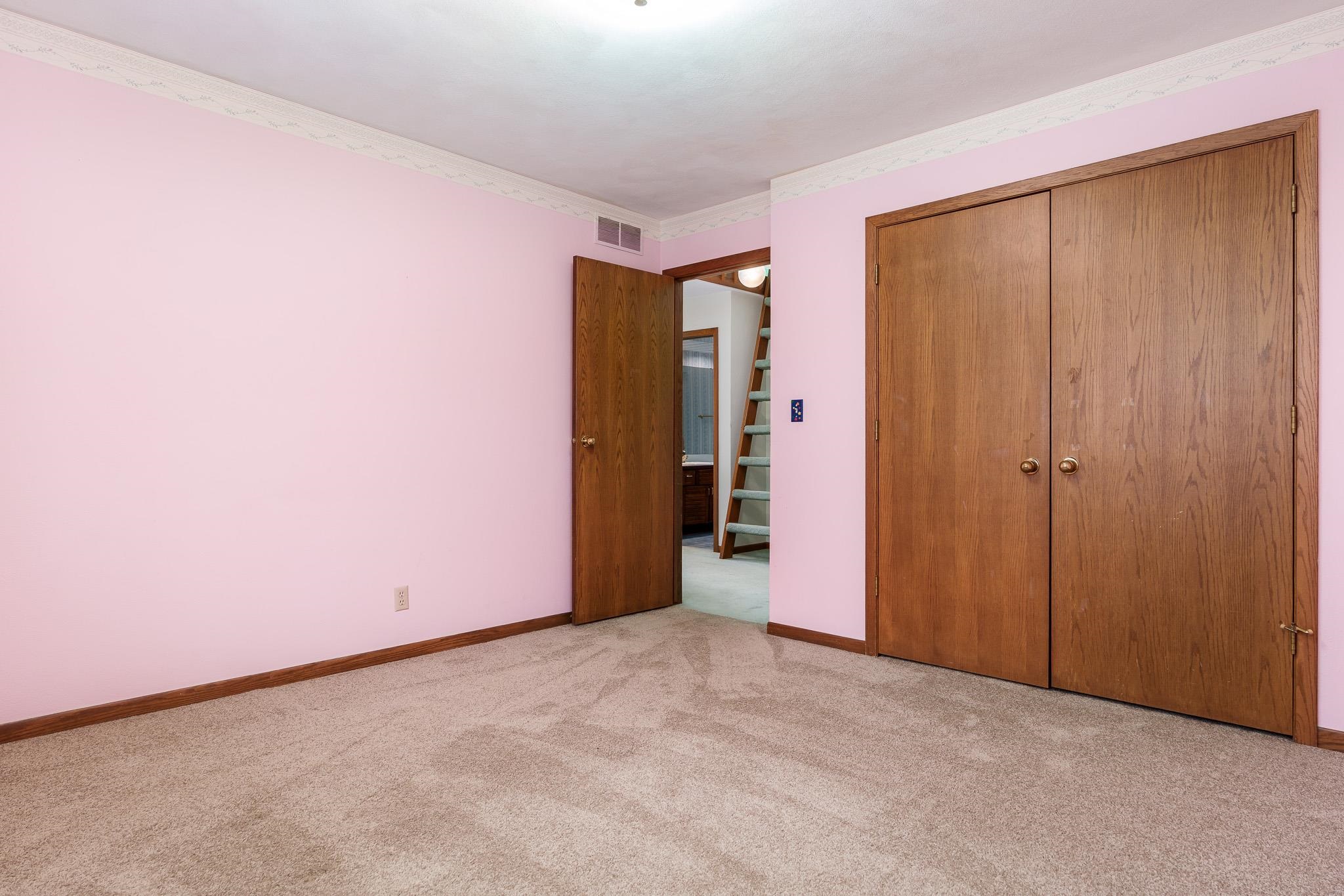 10245 Tybow Trail Roscoe, IL 61073 - Photo 39 of 63 an empty room with closet area