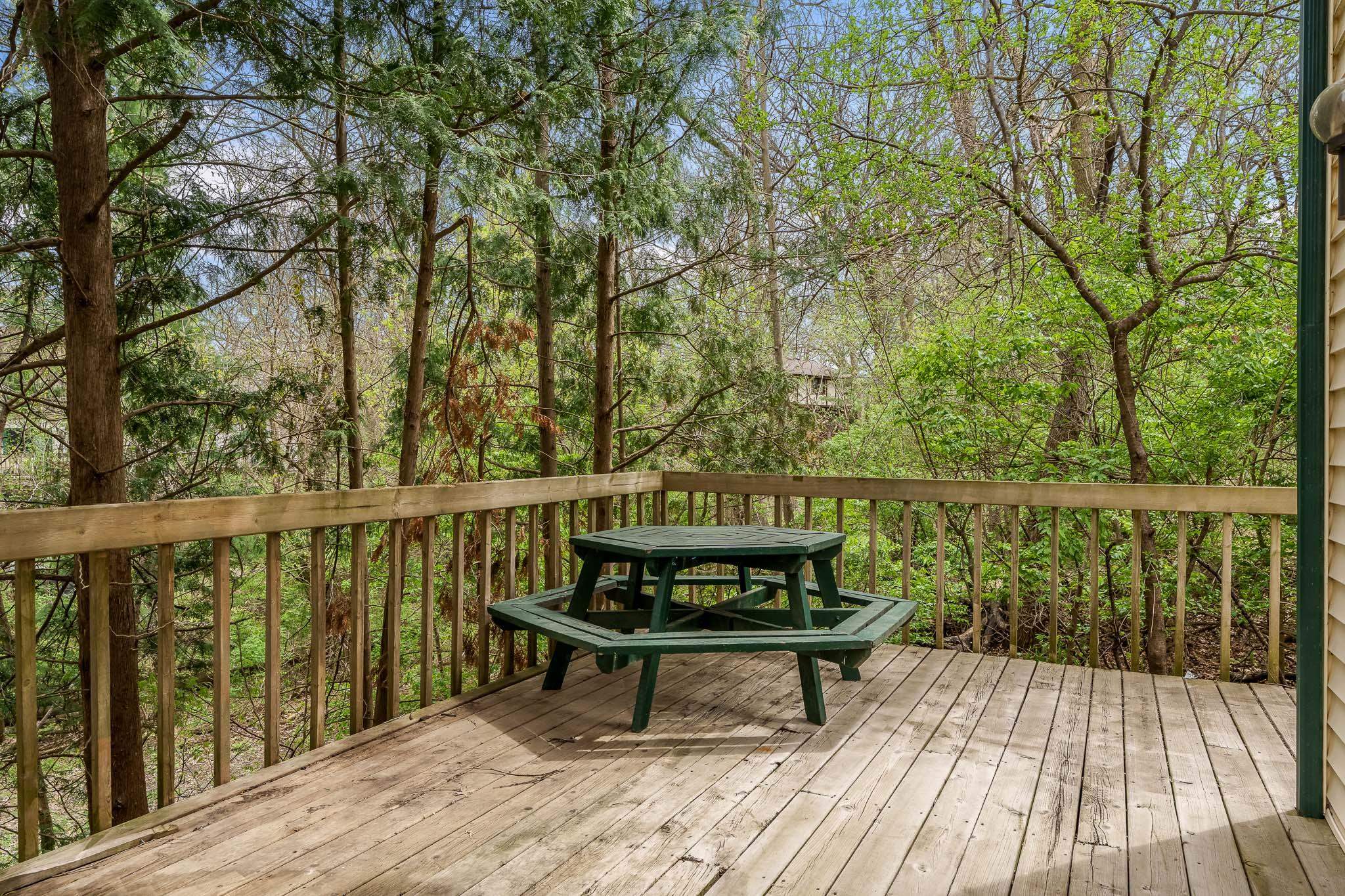 10245 Tybow Trail Roscoe, IL 61073 - Photo 56 of 63 a view of balcony with wooden floor and outdoor seating