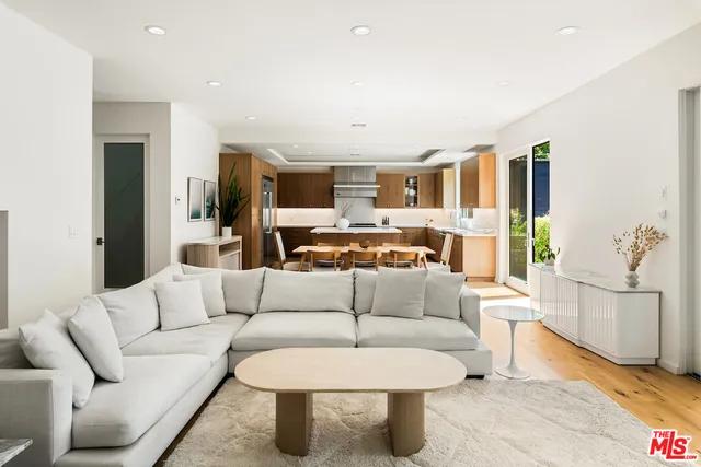 a view of living room kitchen with furniture and a couch