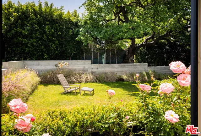 a view of swimming pool with a garden