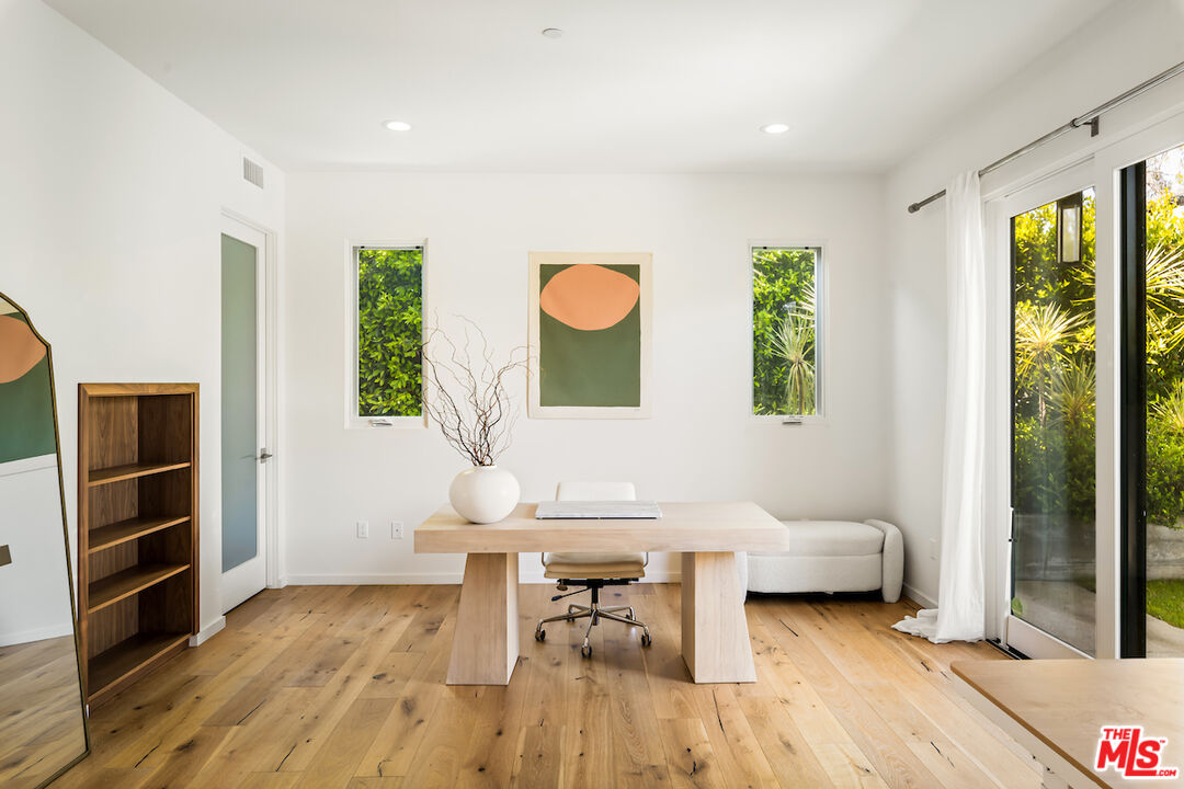 11328 Charnock Road Los Angeles, CA 90066 - Photo 19 of 34 a living room with furniture and a window