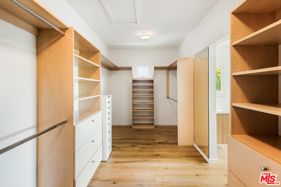 11328 Charnock Road Los Angeles, CA 90066 - Photo 25 of 34 a view of walk in closet with empty racks
