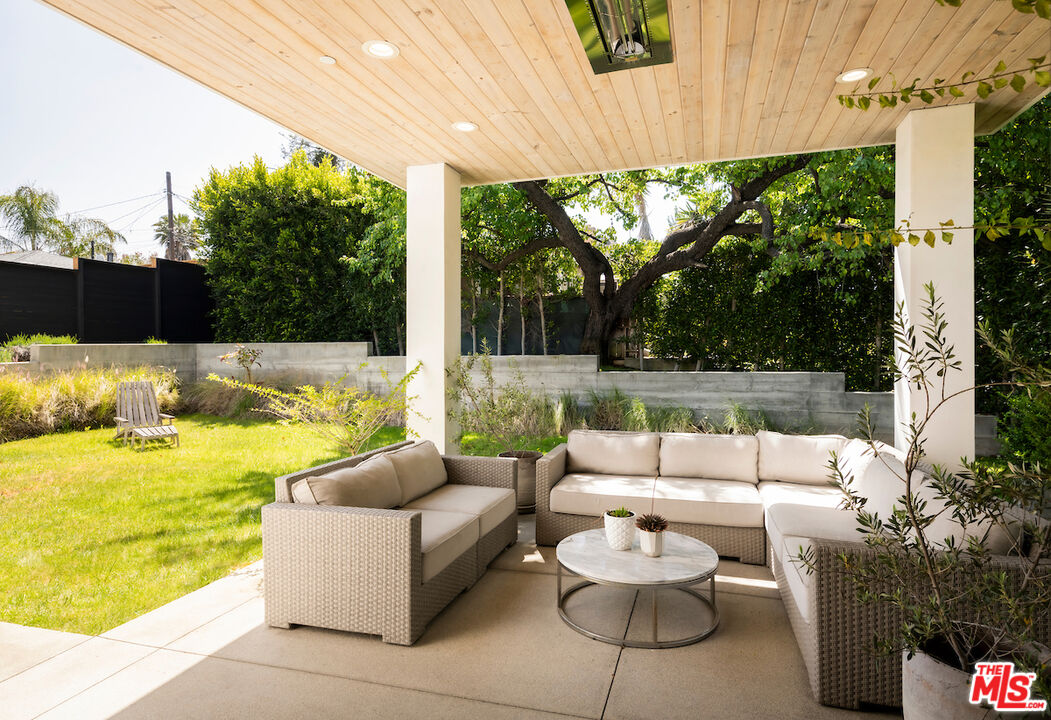 11328 Charnock Road Los Angeles, CA 90066 - Photo 3 of 34 a outdoor living space with furniture and garden view