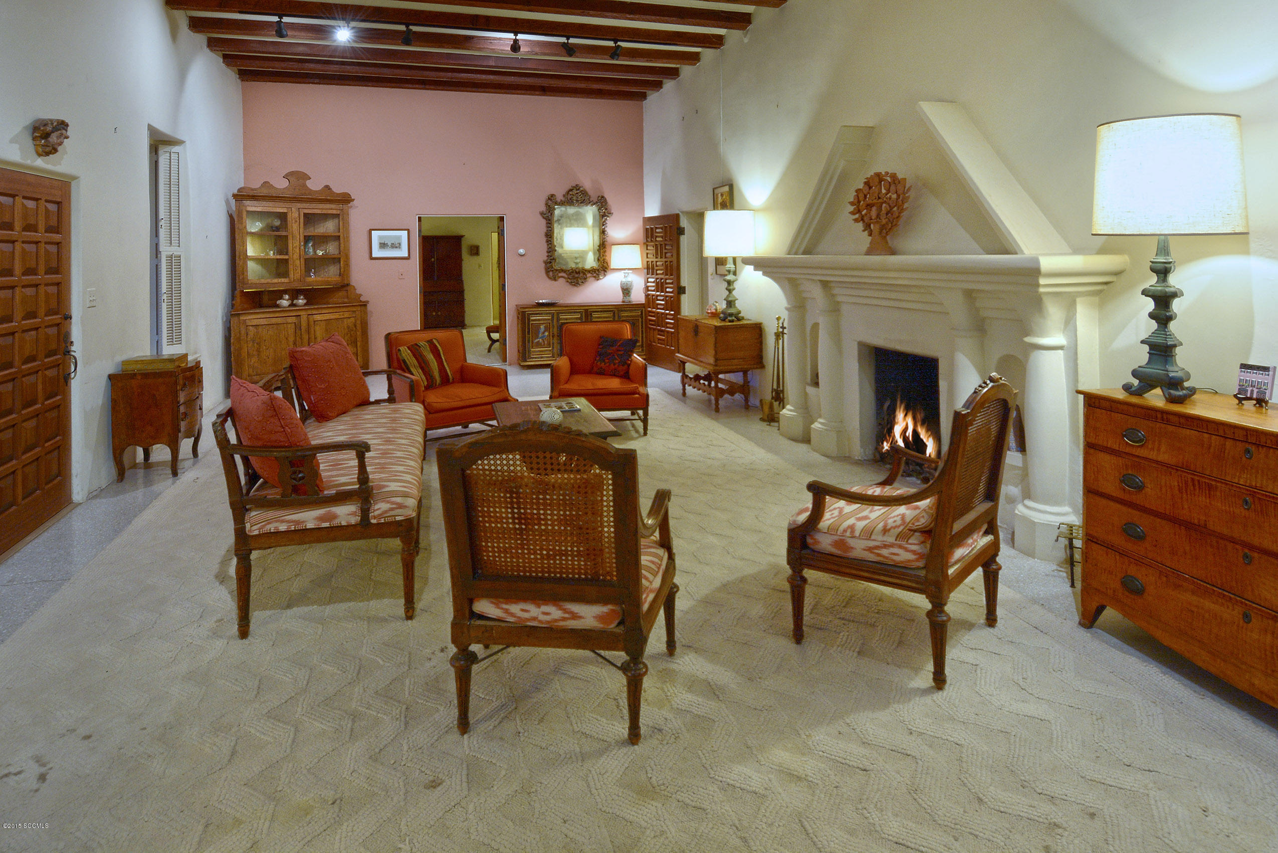 87 Clark Crossing Road Rio Rico, AZ 85648 - Photo 11 of 51 a living room with furniture and a fireplace
