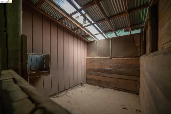 a view of a room with racks on the wall