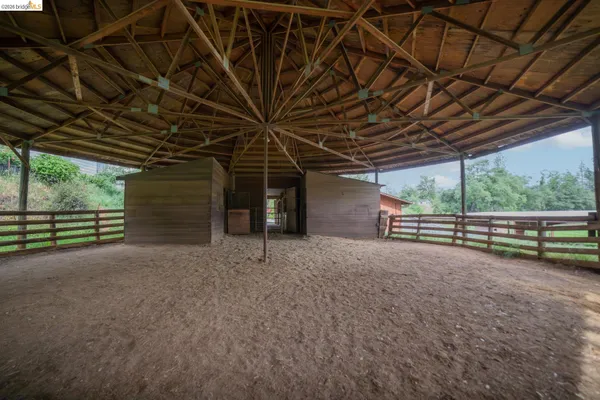 a view of a room with wooden walls