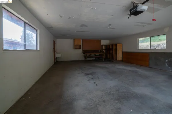 a view of porch with wooden floor
