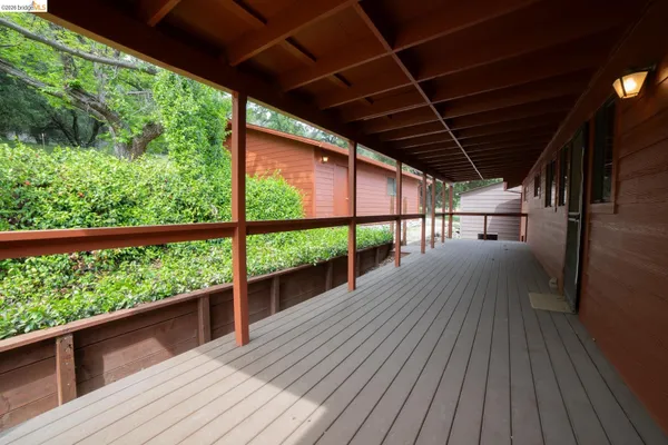 a view of house with patio outdoor seating