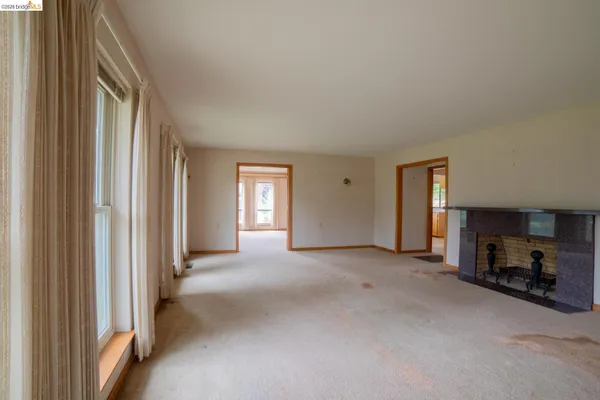 a view of a livingroom with a staircase