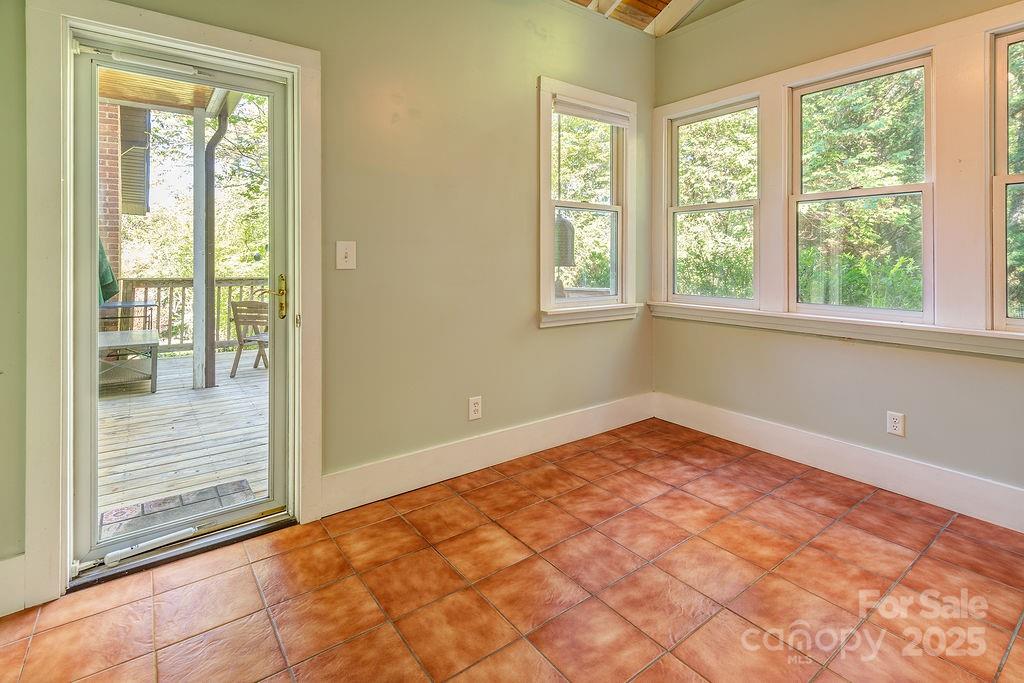 54 Spooks Branch Road Asheville, NC 28804 - Photo 16 of 41 a view of an empty room and window