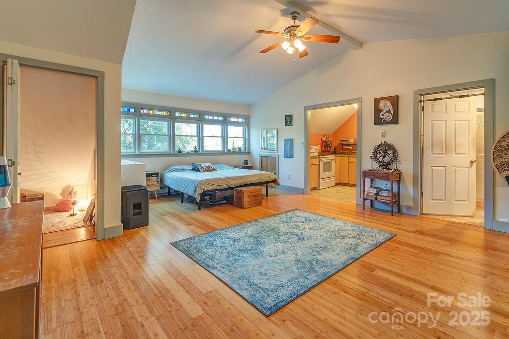 54 Spooks Branch Road Asheville, NC 28804 - Photo 28 of 41 a living room with furniture and wooden floor