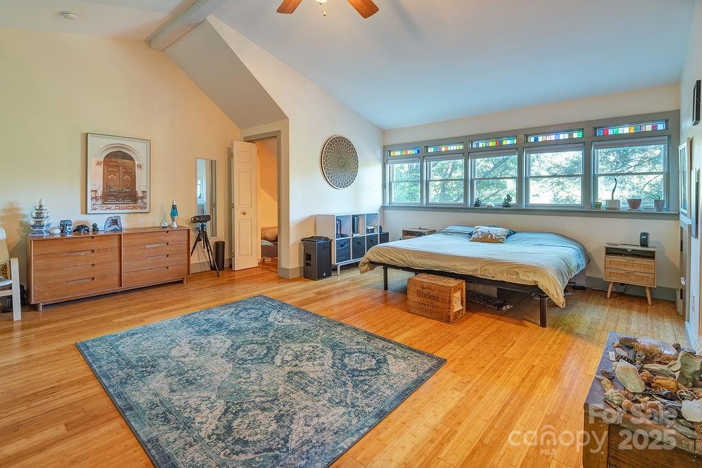 54 Spooks Branch Road Asheville, NC 28804 - Photo 29 of 41 a living room with furniture and a table