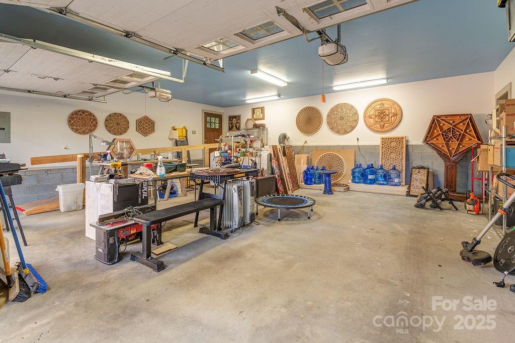 54 Spooks Branch Road Asheville, NC 28804 - Photo 34 of 41 a view of a room with gym equipment