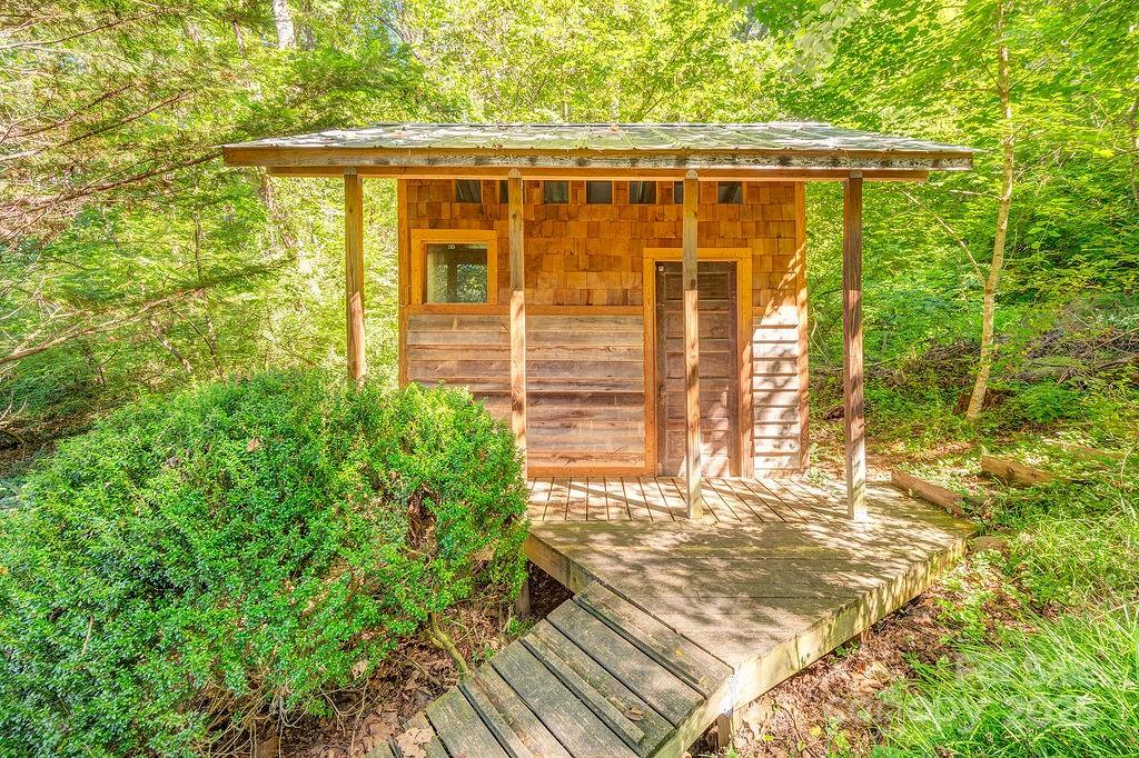 54 Spooks Branch Road Asheville, NC 28804 - Photo 39 of 41 a view of a house with a door and wooden floor