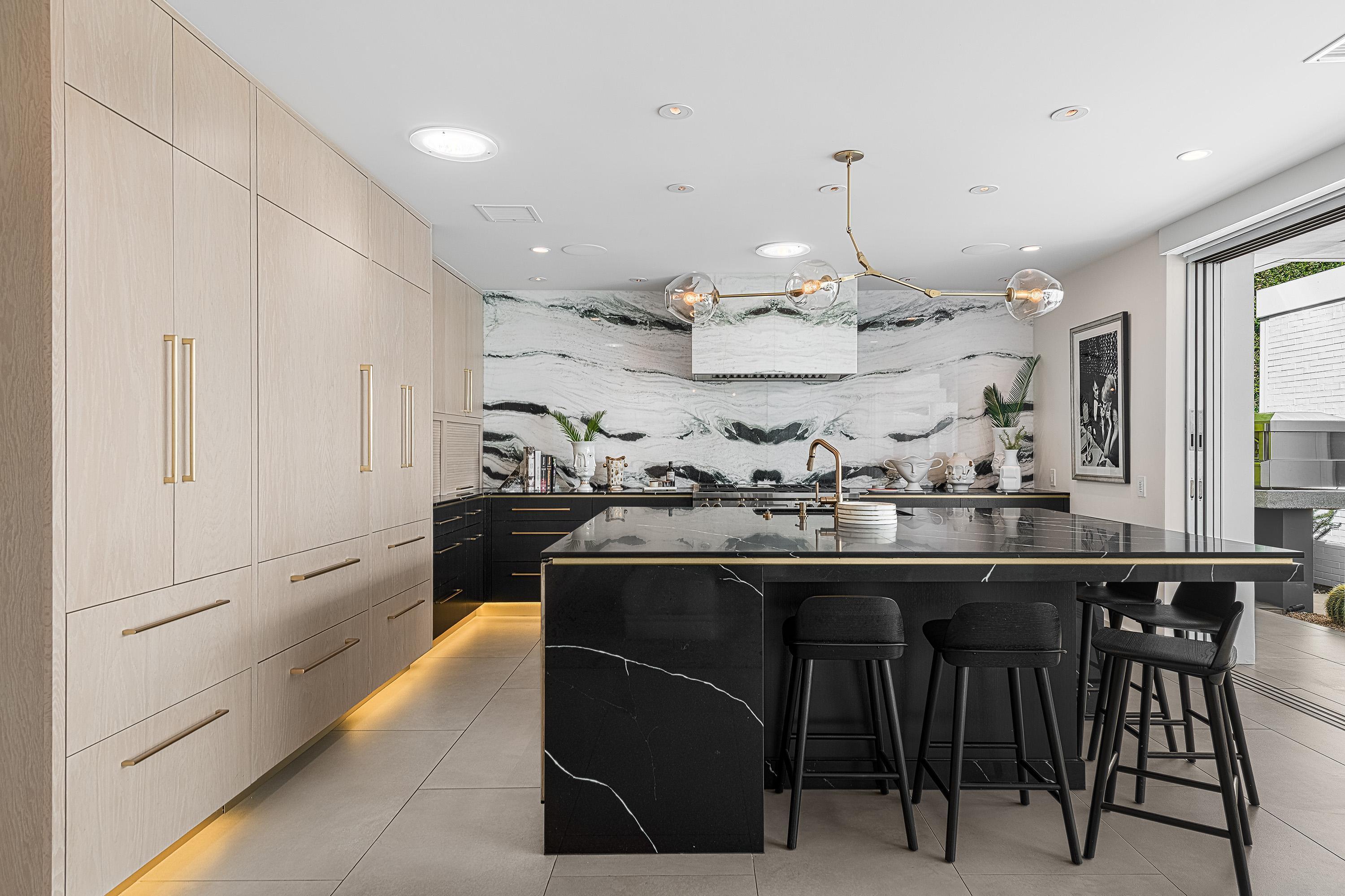 70260 Carson Road Rancho Mirage, CA 92270 - Photo 13 of 80 a kitchen with stainless steel appliances granite countertop a sink and a refrigerator
