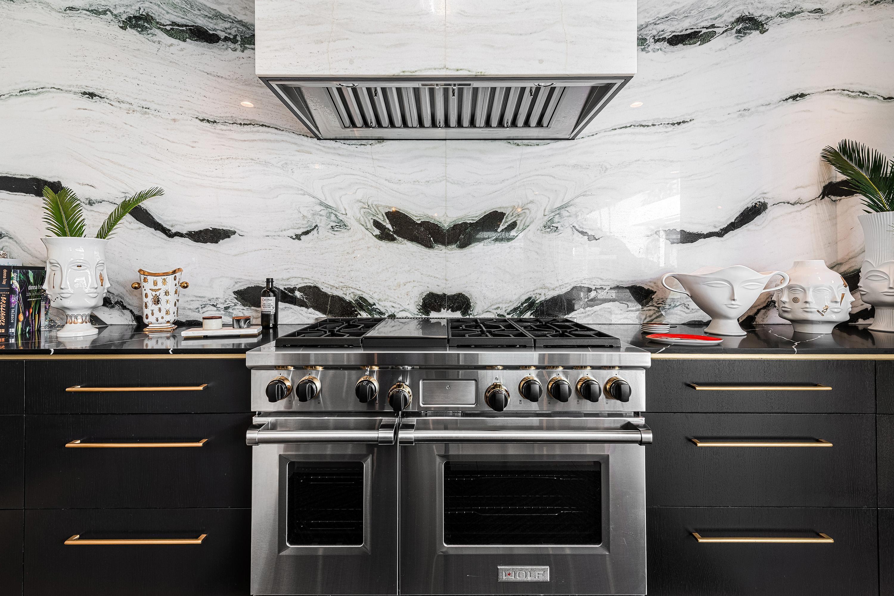 70260 Carson Road Rancho Mirage, CA 92270 - Photo 15 of 80 a stove top oven sitting inside of a kitchen