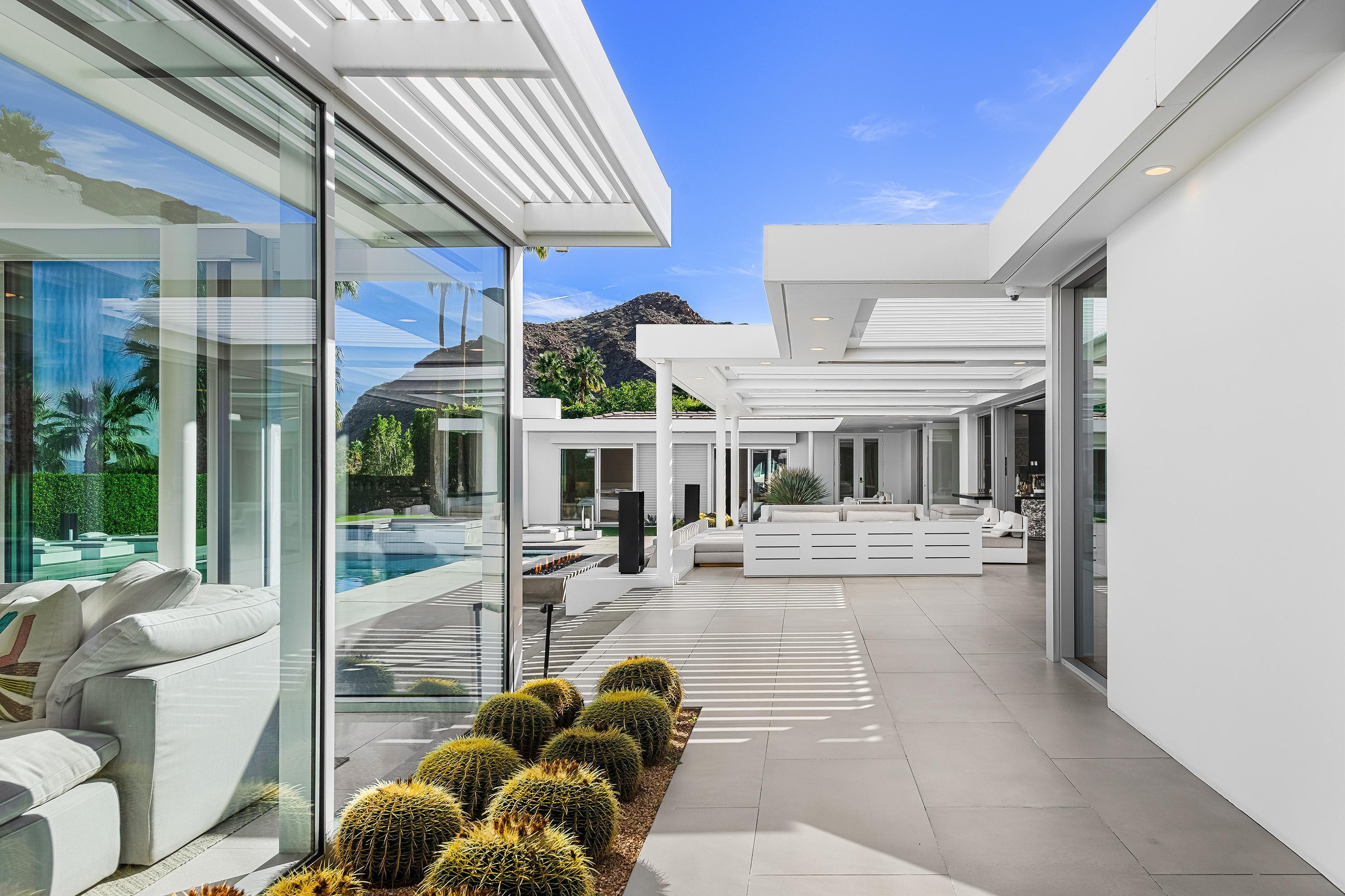 70260 Carson Road Rancho Mirage, CA 92270 - Photo 17 of 80 a view of living room with patio furniture and porch