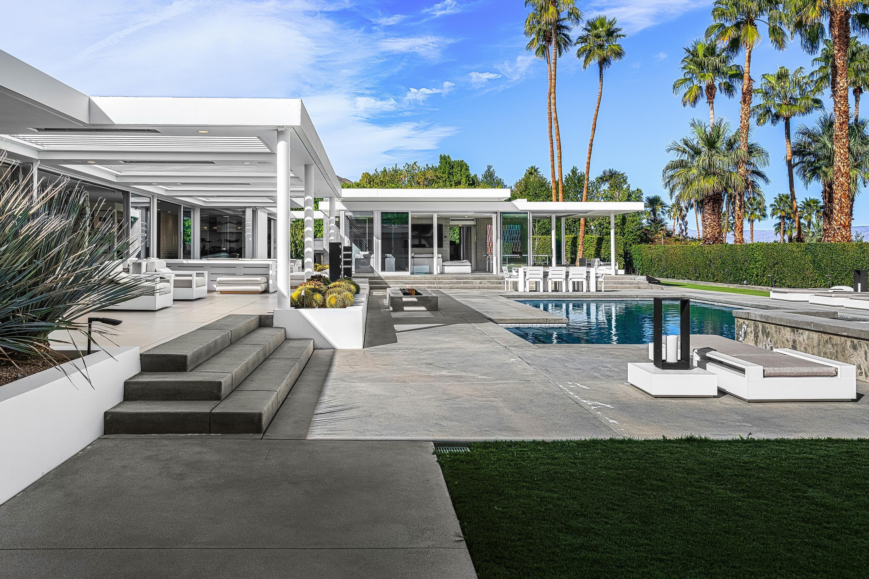 70260 Carson Road Rancho Mirage, CA 92270 - Photo 25 of 80 swimming pool view with a seating space