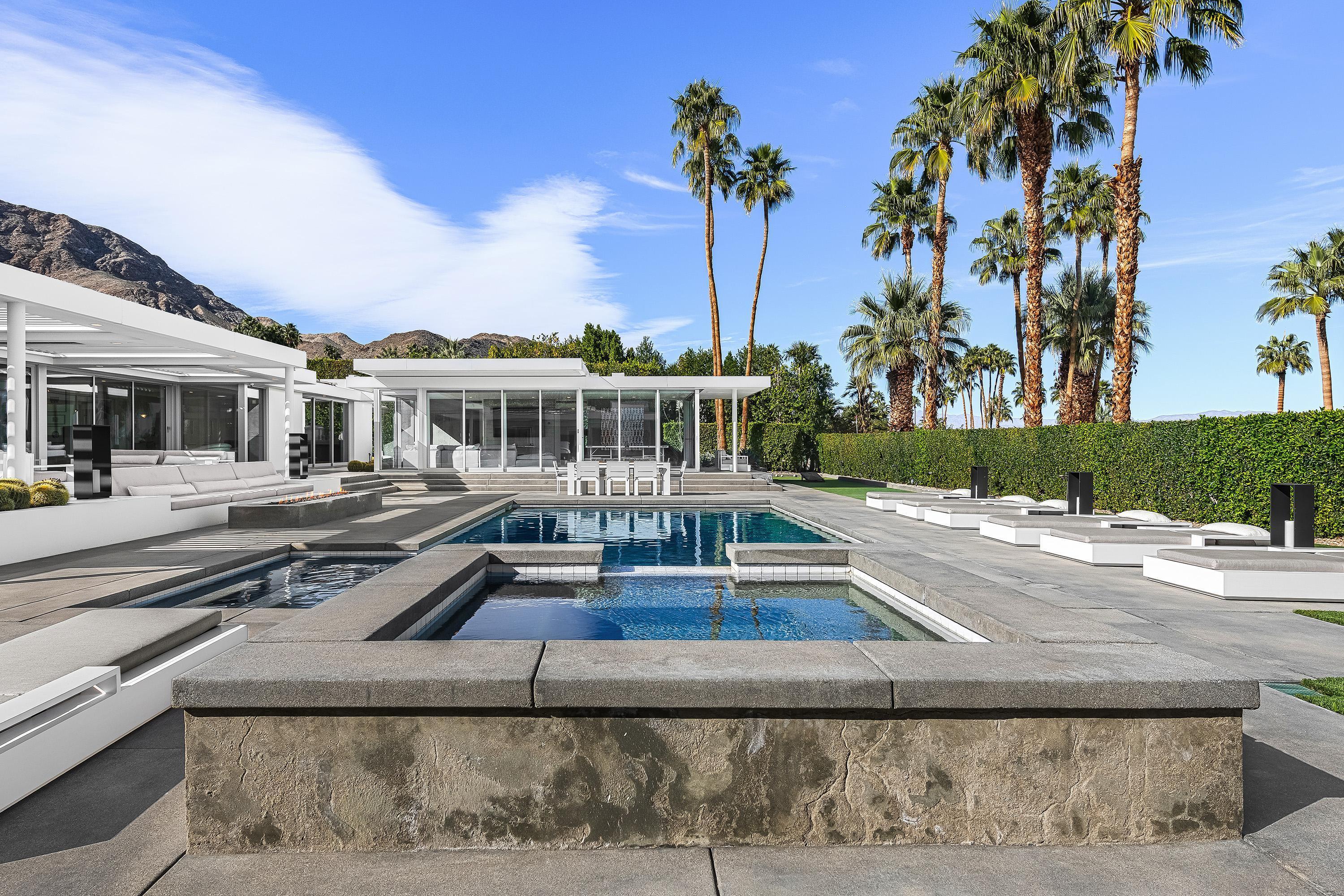 70260 Carson Road Rancho Mirage, CA 92270 - Photo 29 of 80 a view of a house with a swimming pool