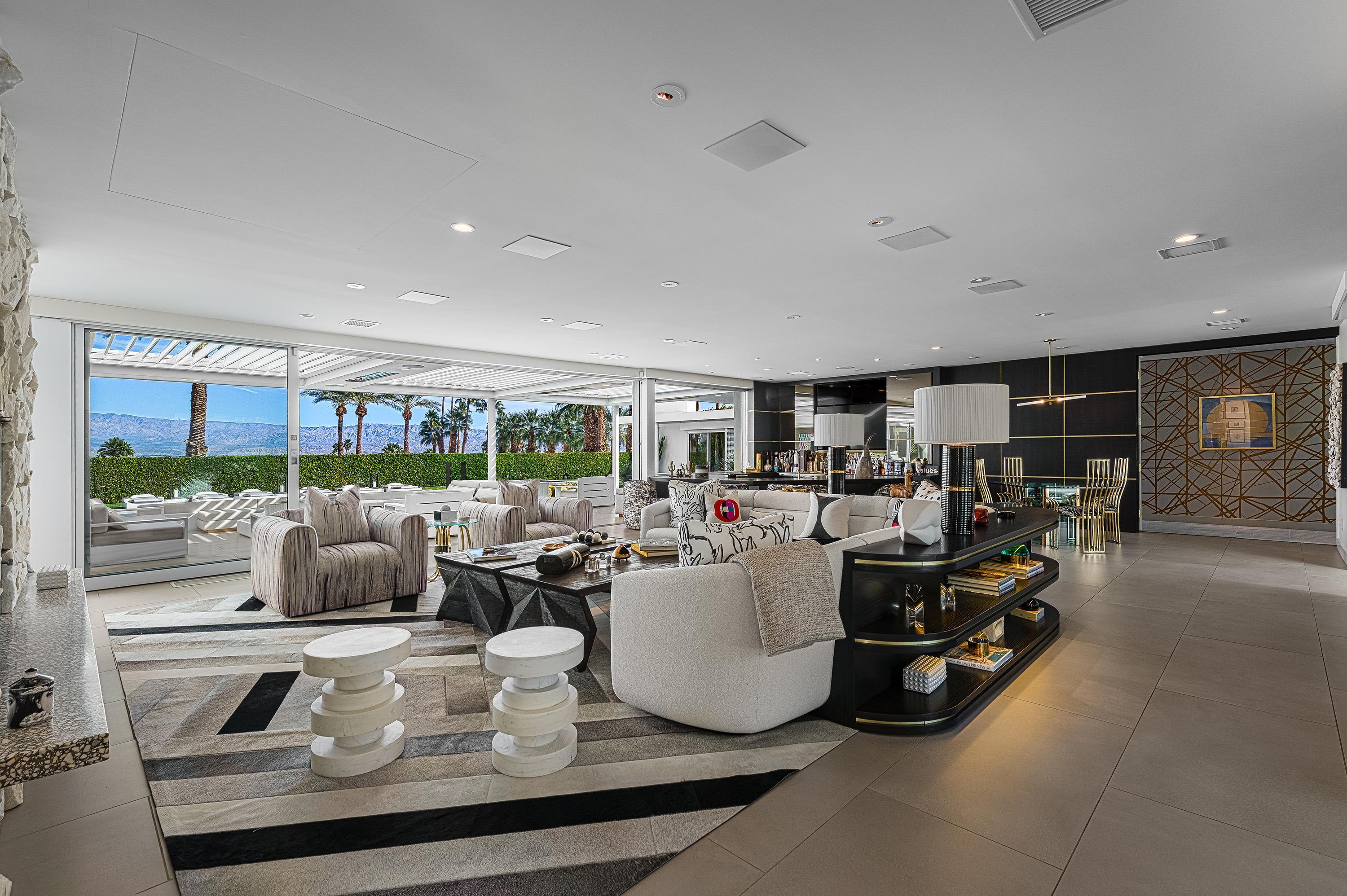 70260 Carson Road Rancho Mirage, CA 92270 - Photo 4 of 80 a living room with furniture and a large window