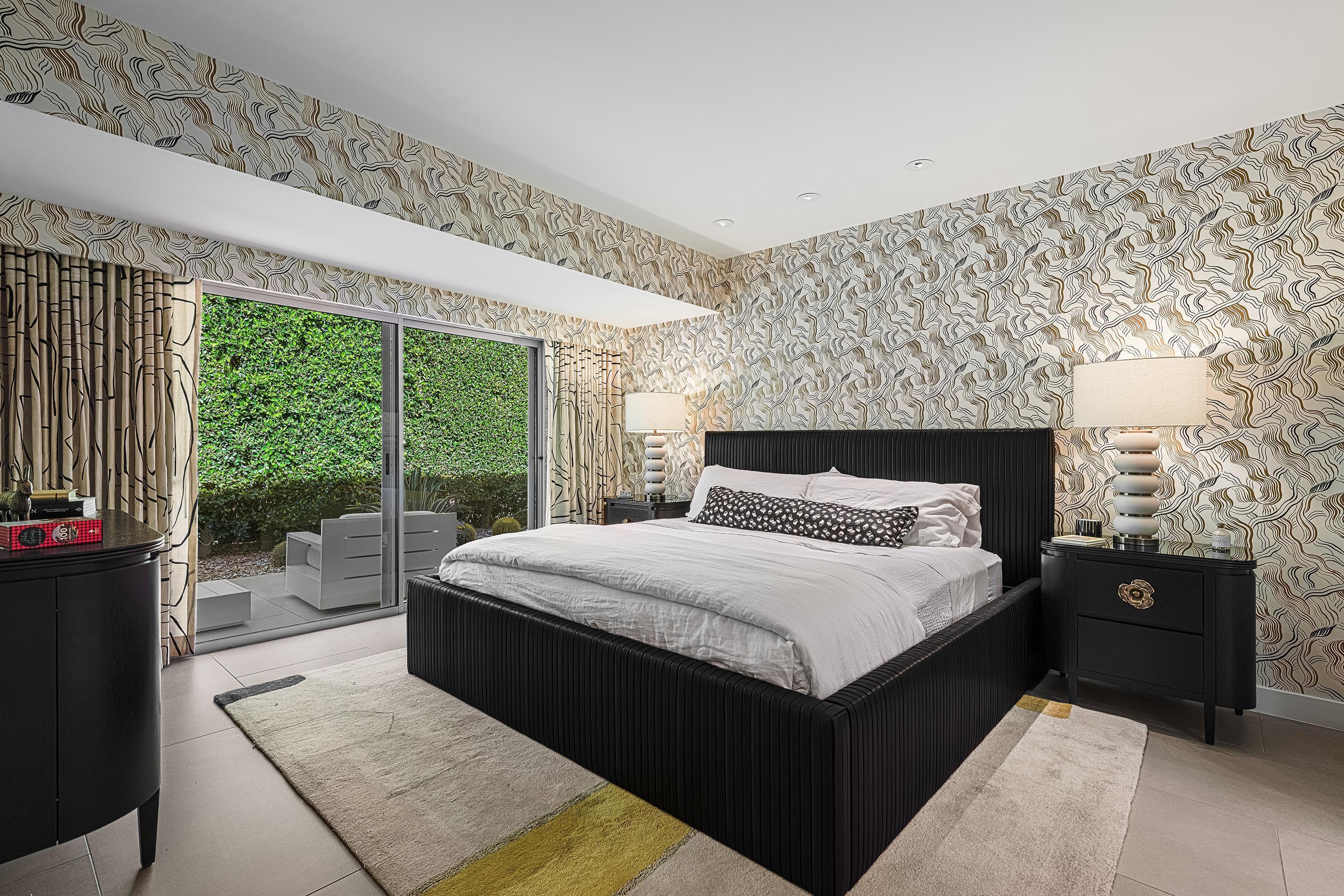 70260 Carson Road Rancho Mirage, CA 92270 - Photo 49 of 80 a bedroom with a bed and a large window