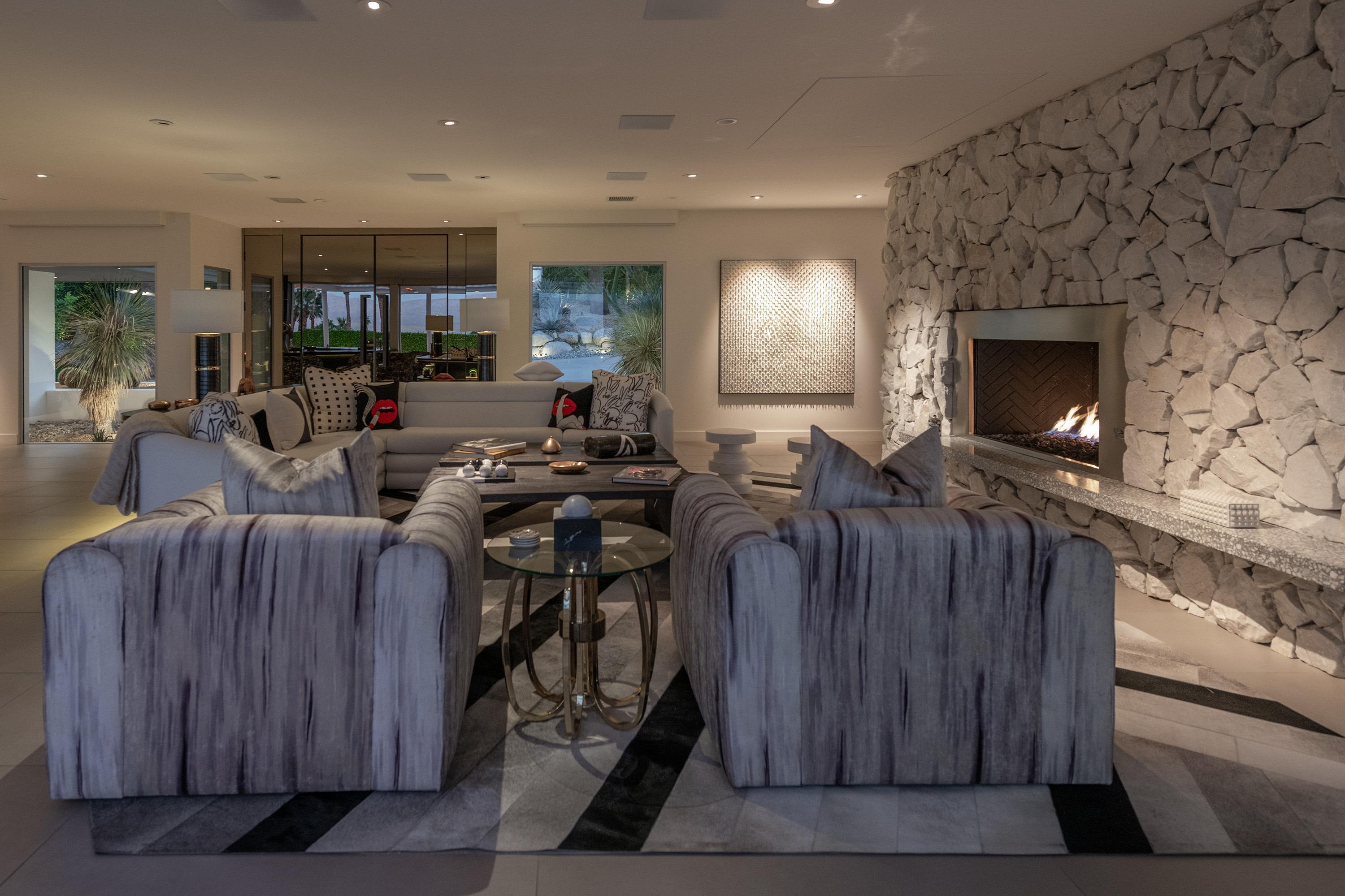 70260 Carson Road Rancho Mirage, CA 92270 - Photo 63 of 80 a living room with furniture a fireplace and a flat screen tv