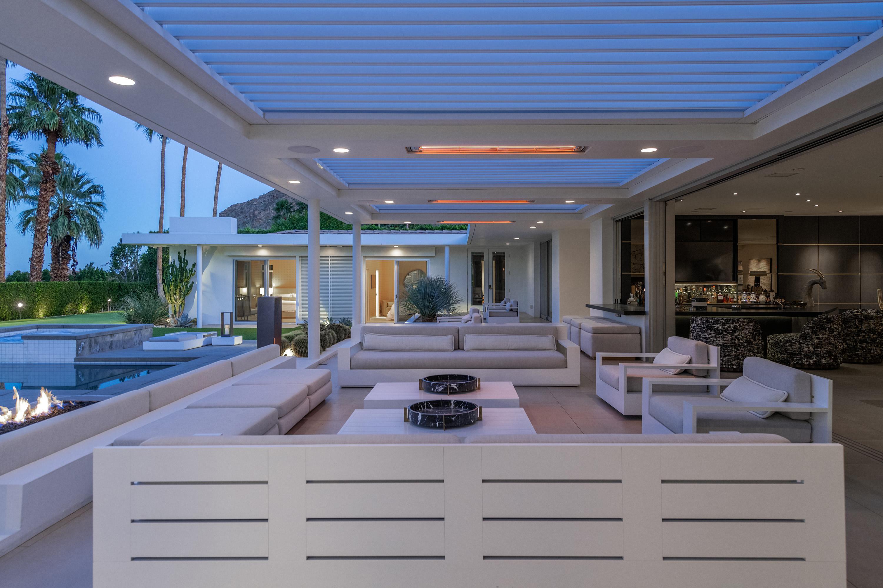 70260 Carson Road Rancho Mirage, CA 92270 - Photo 66 of 80 a kitchen with stainless steel appliances kitchen island granite countertop a stove and cabinets
