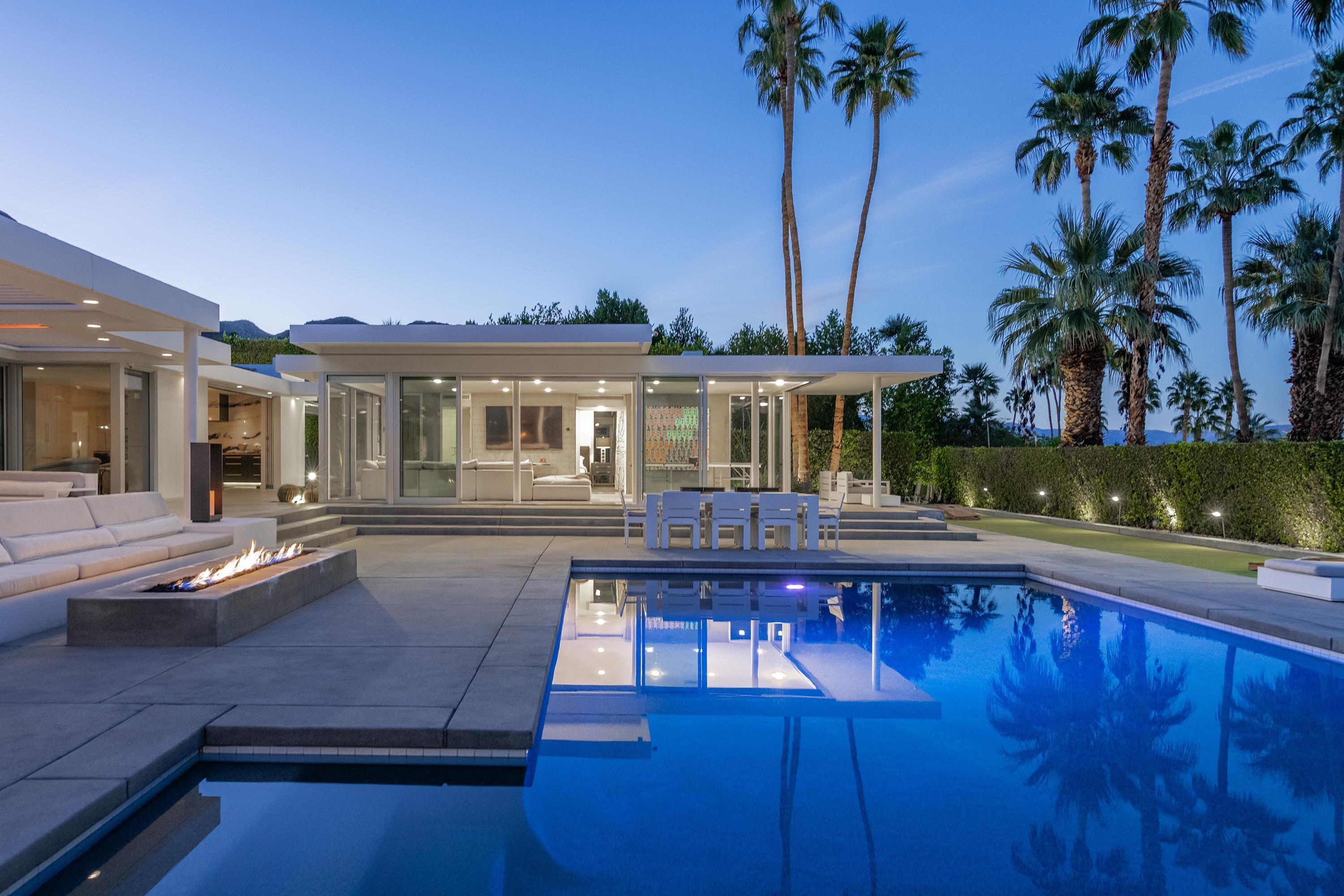 70260 Carson Road Rancho Mirage, CA 92270 - Photo 72 of 80 a view of a house with pool and chairs