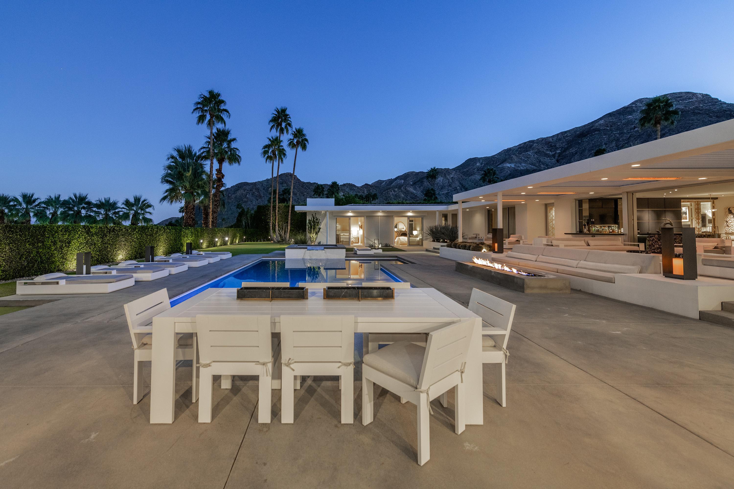 70260 Carson Road Rancho Mirage, CA 92270 - Photo 80 of 80 a view of a patio with a table and chairs