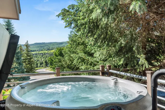 a view of a swimming pool with a sitting space