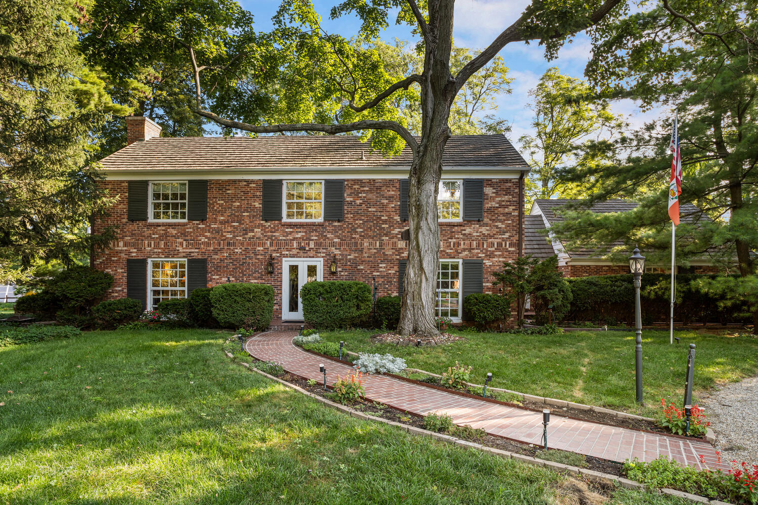 812 Dodds Drive Champaign, IL 61820 - Photo 1 of 18 a front view of a house with garden