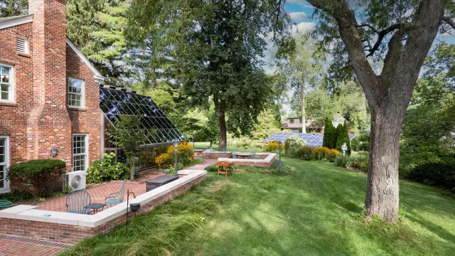 a view of grassy field with trees