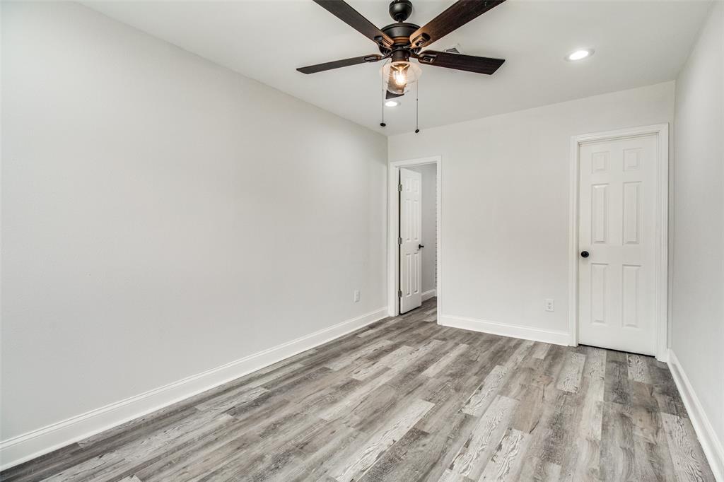1201 Ridgewood Road Denison, TX 75020 - Photo 20 of 29 Spare room with light hardwood / wood-style floors and ceiling fan