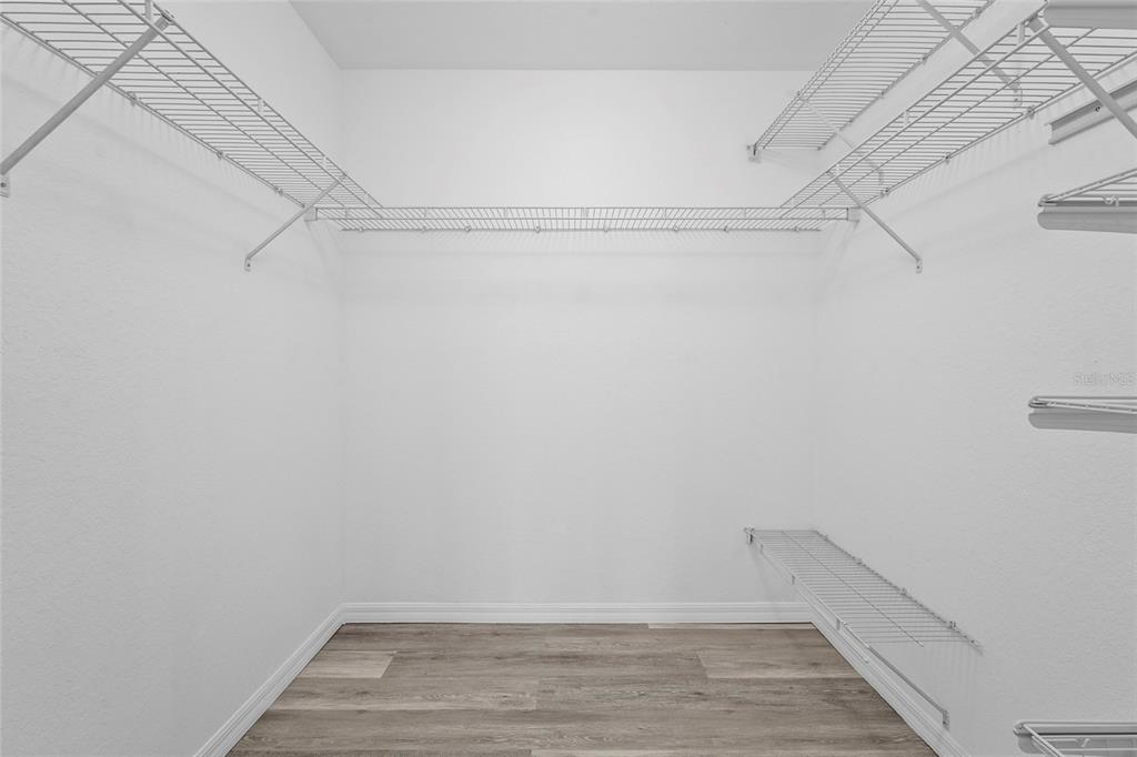 23655 Jennings Road Myakka City, FL 34251 - Photo 11 of 43 a view of a room with racks on the wall